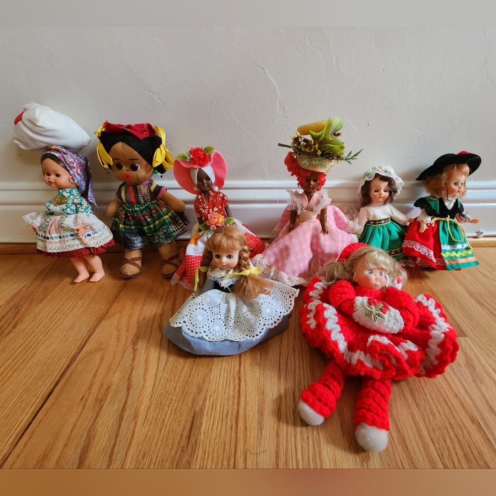 Collection of eight multi-cultural dolls